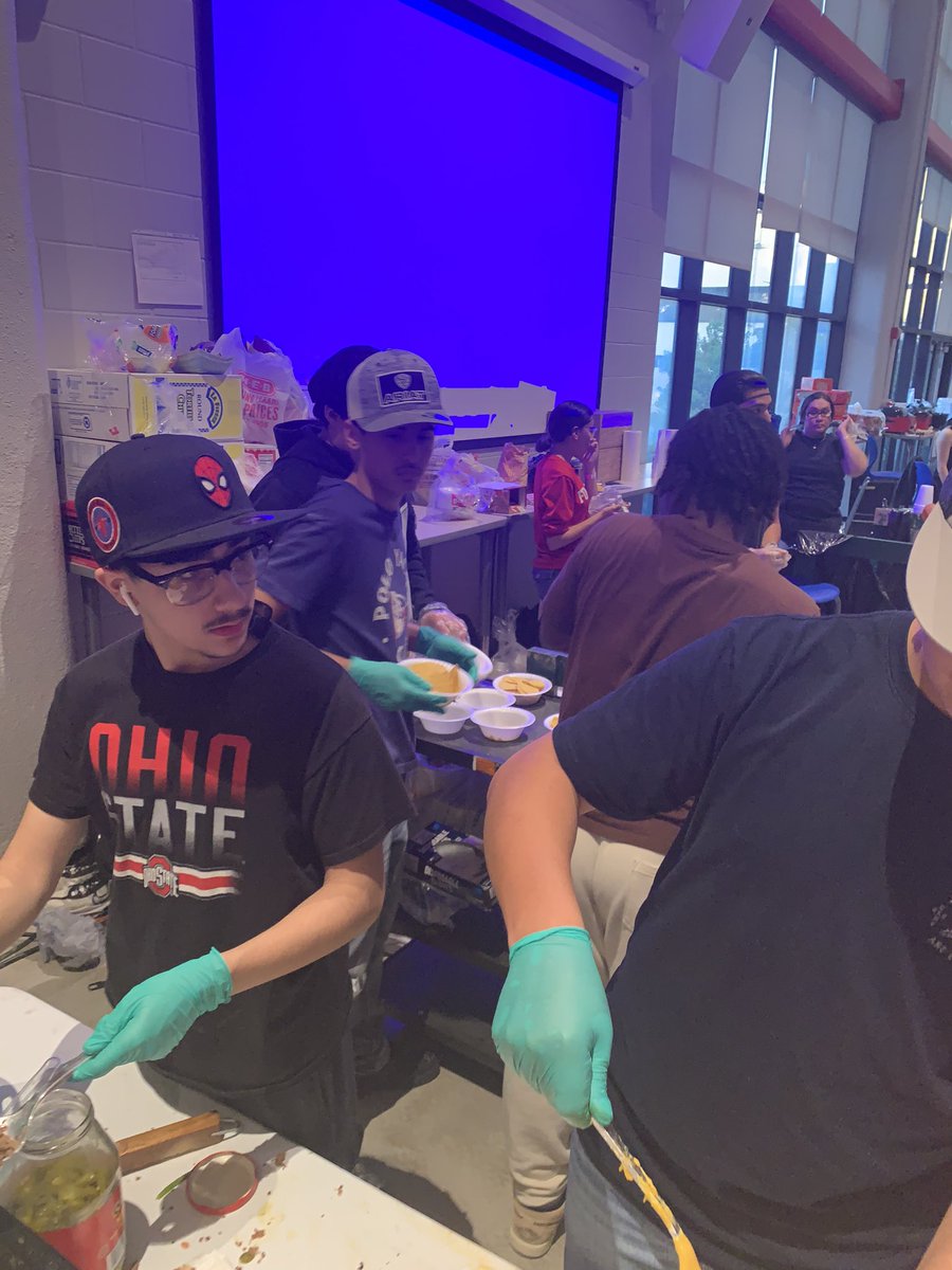 Our boys basketball athletes & mgrs. are the best! Demonstrating what community service is all about by helping at annual @Fox_Tech_HS Night In Old Tech festival in our Nacho booth. 🦬🏀#BeABuffalo @Fox_Tech_HS @CoachJSifuentes @SAISD @SAISDAthletics