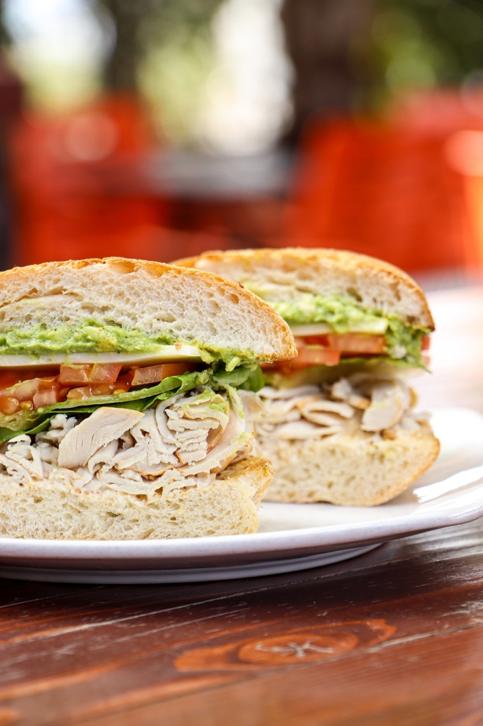 Lunch run 🏃Or stay! 🧘 Our Stacked Turkey Sandwich has been a favorite since we opened in 2011 and is available all day! 🥪🤩  Enjoy it on our dog friendly patio, freshly prepared to-go at our drive thru, or delivered! Carry out orders: 32shea.com