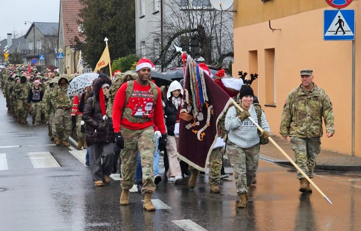 Soldiers of the 47th Brigade Support Battalion, 2nd Armored Brigade Combat Team, 1st Armored Division take part in the annual "Pioneer Rush" ruck march, Dec. 19, 2023. This year's iteration saw Soldiers delivering gifts to children in Drawsko Pomorskie, Poland.
