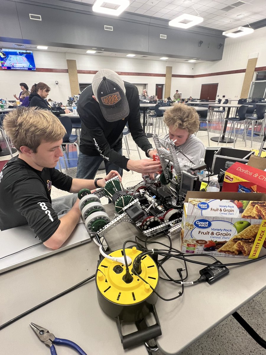 Students from Wood County Christian putting some finishing touches on their robot prior to competition