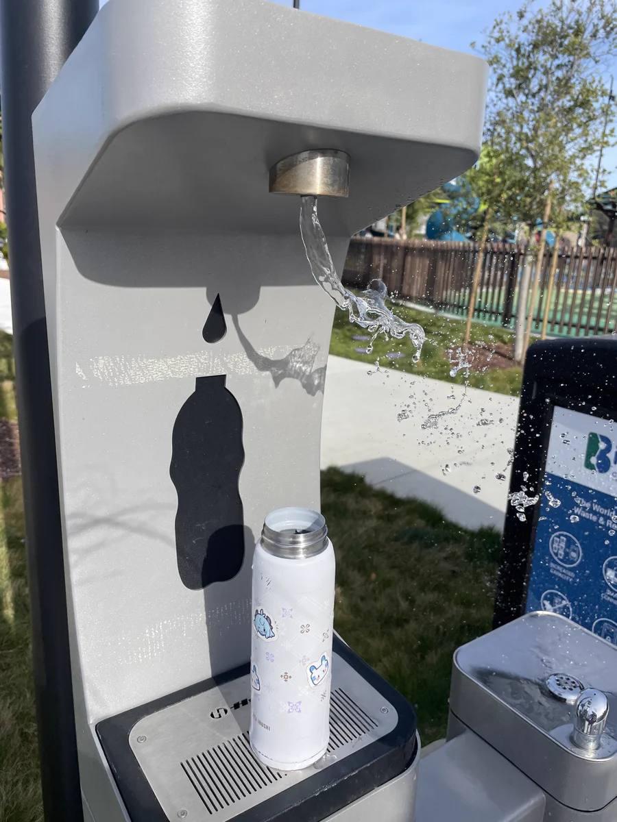 photo of wind blowing water away from water fill station