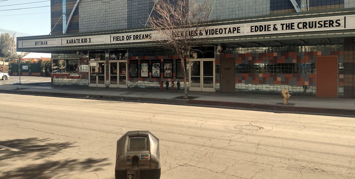 Vandals that are videophiles rearranged letters on the marquee of a long-shuttered movie theater.