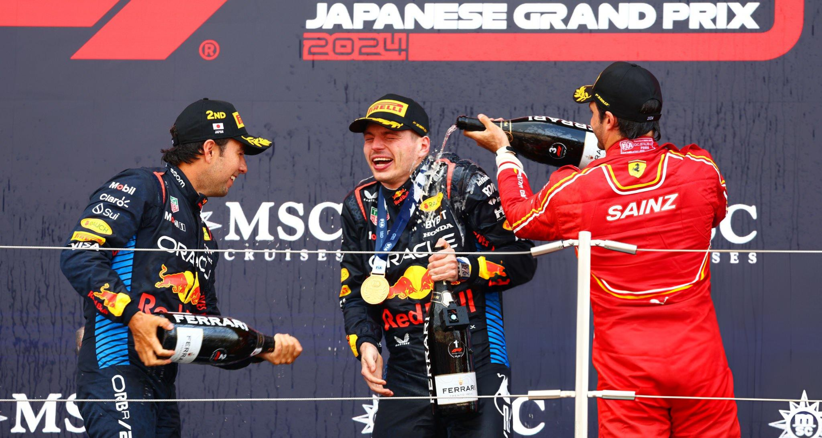 Verstappen, Checo y Sainz celebrando en el podio. Fuente: Fórmula 1