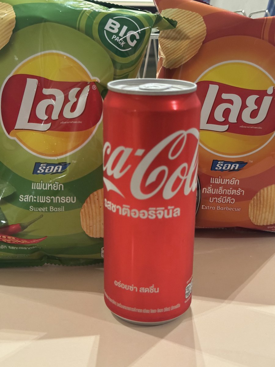 I love to try #Lays and #CokeCola in new countries. The #chips and #soda are #delicious. These are my favorite from my #ThailandTravel