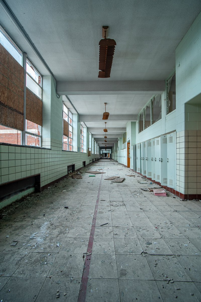 School Daze; a once bustling hallway inside an abandoned middle school in Flint, Michigan.