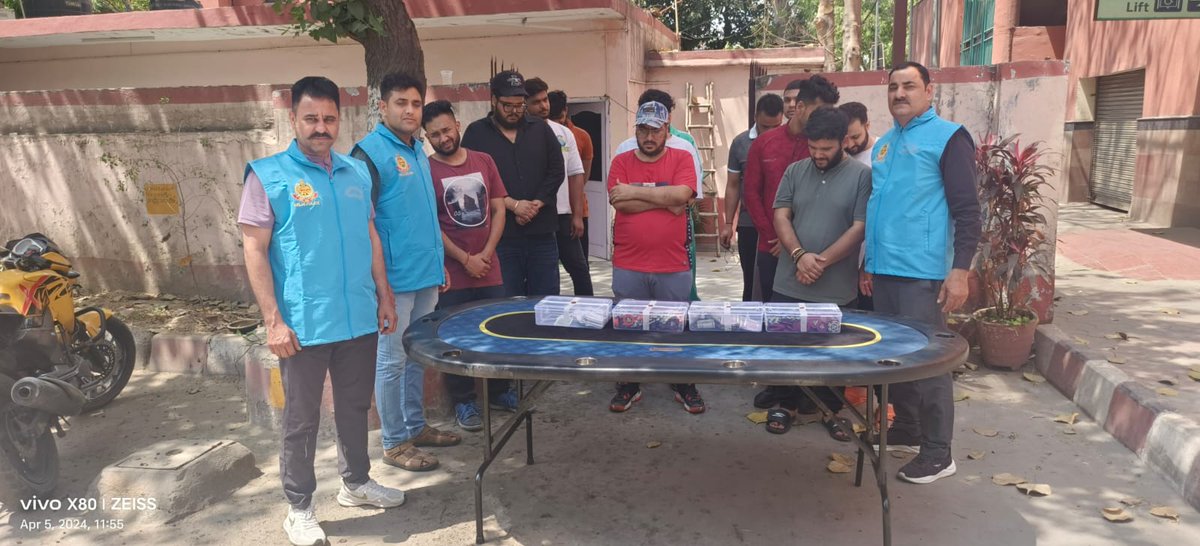 A Gambling den busted by the team of AATS in the Rajouri Garden area. - 13 persons, including the organiser, apprehended - Recovery of more than Rs. 1 Lakh of bet-money - Plastic coins (to represent currency) and playing cards also recovered from the spot