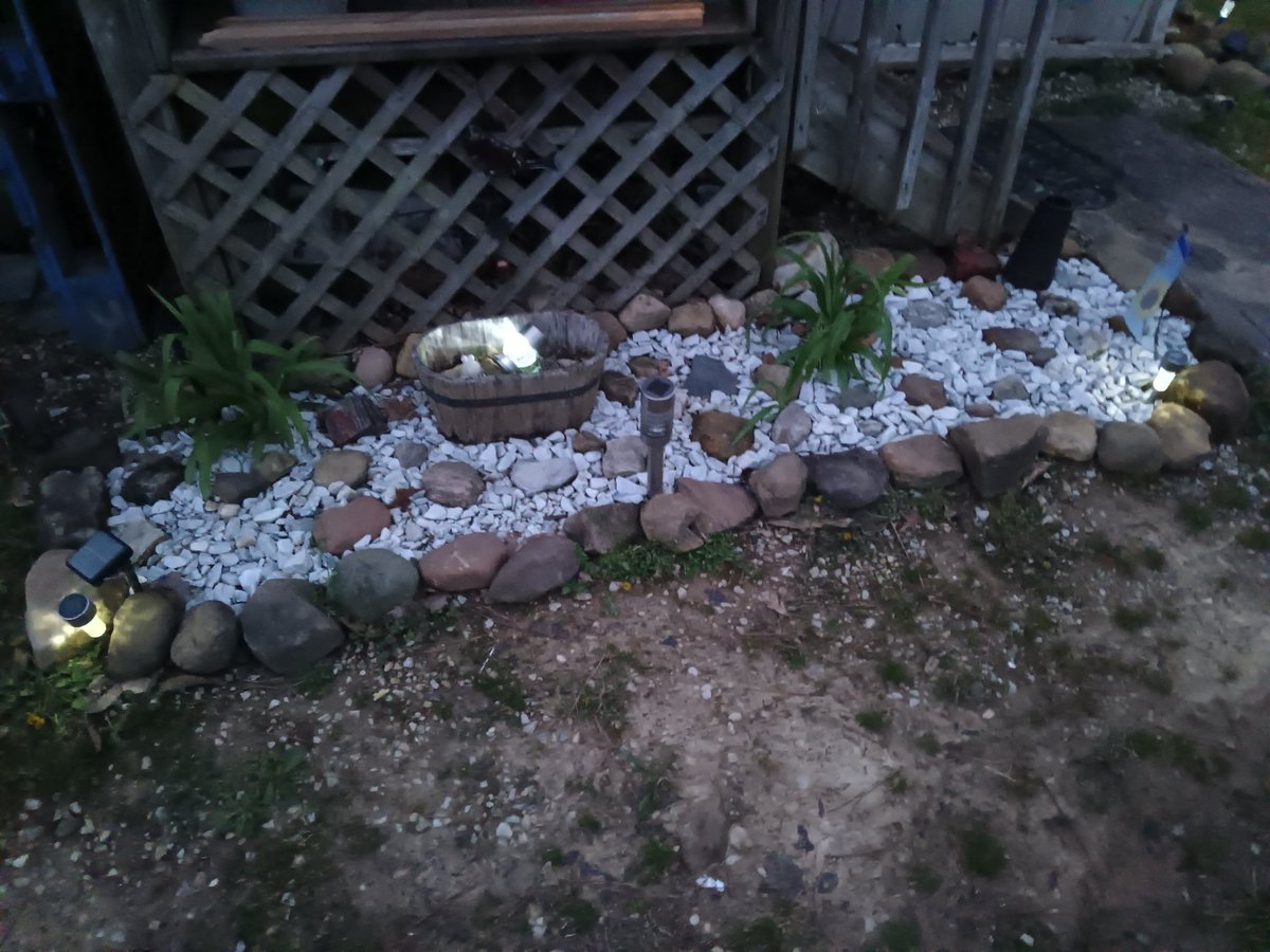 Here's my rock garden. I have a beautiful fountain that my husband bought me that I put in the corner of this, but I haven't brought it back out yet.