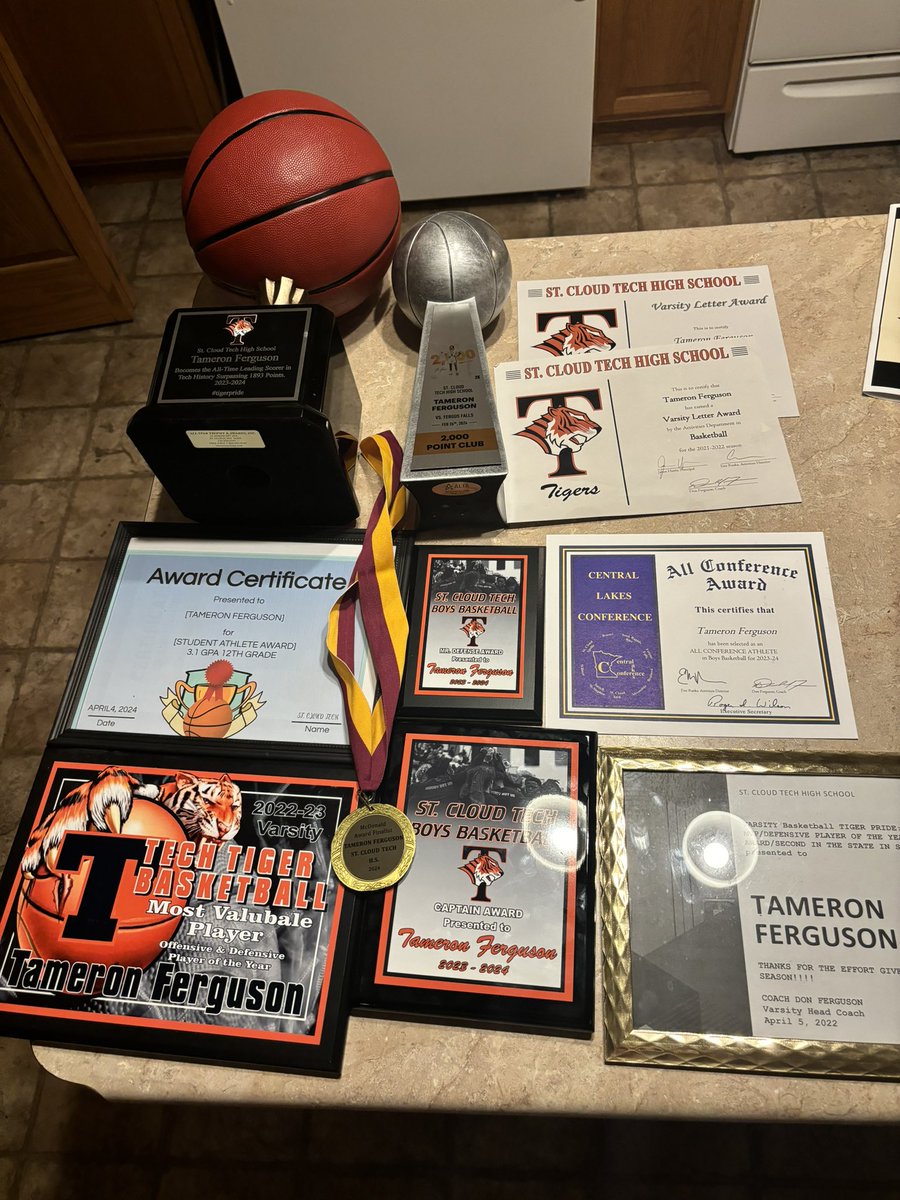 Final basketball banquet , 2 year Captain 3-time Central Lakes first team All-Conference member of 2,000 Points Club...Tiger career record holder in career points and steals named to2022 State Tournament Class AAA All-Tournament team Mr. Basketball Top 10  McDonald Award finalist