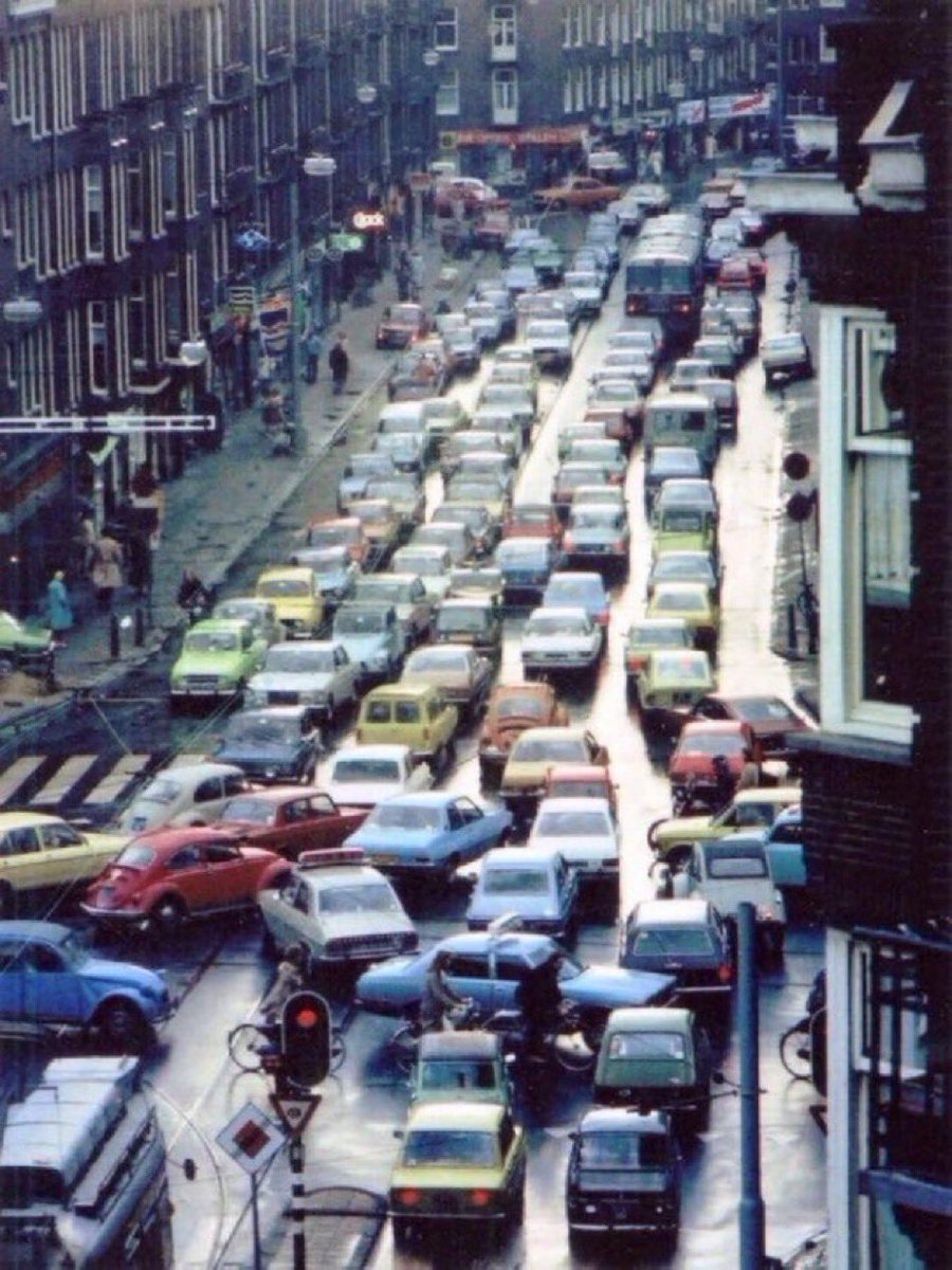 Remember this picture every single time you hear someone in your city say 'we're not Amsterdam.' This was #Amsterdam in the 1970s, via @fietsprofessor. The cities we admire made better choices regarding cars, and are still making them today. Better choices instead of excuses.