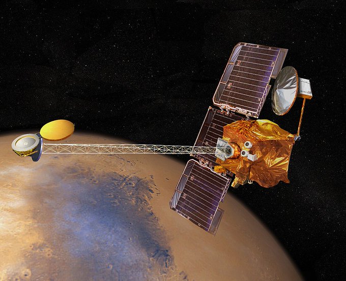 Artist's concept of 2001 Mars Odyssey spacecraft over Syrtis Major Planum.