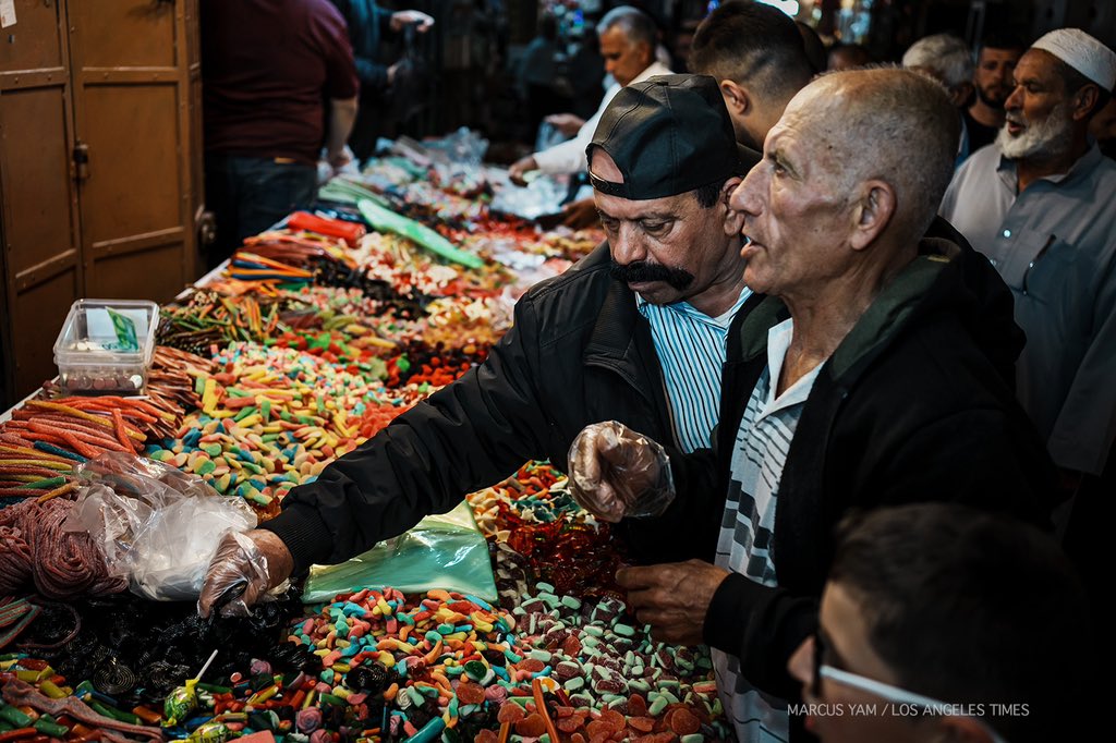 Daily life #3: #Ramadan  meals in the old city of #Jerusalem isn’t complete without qatayef, falafel, olives and candy. #photojournalism