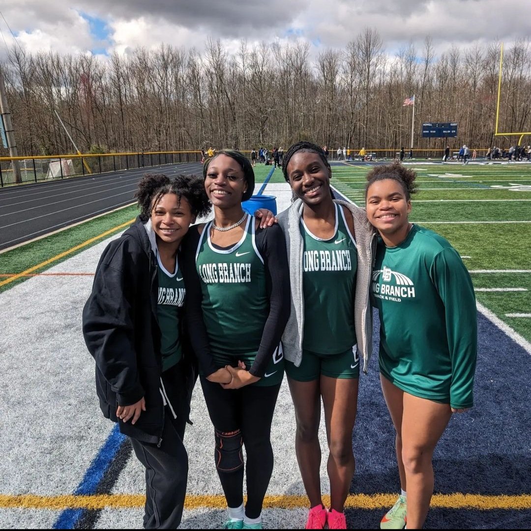 The track and field lady wave... outdoor season has begun!