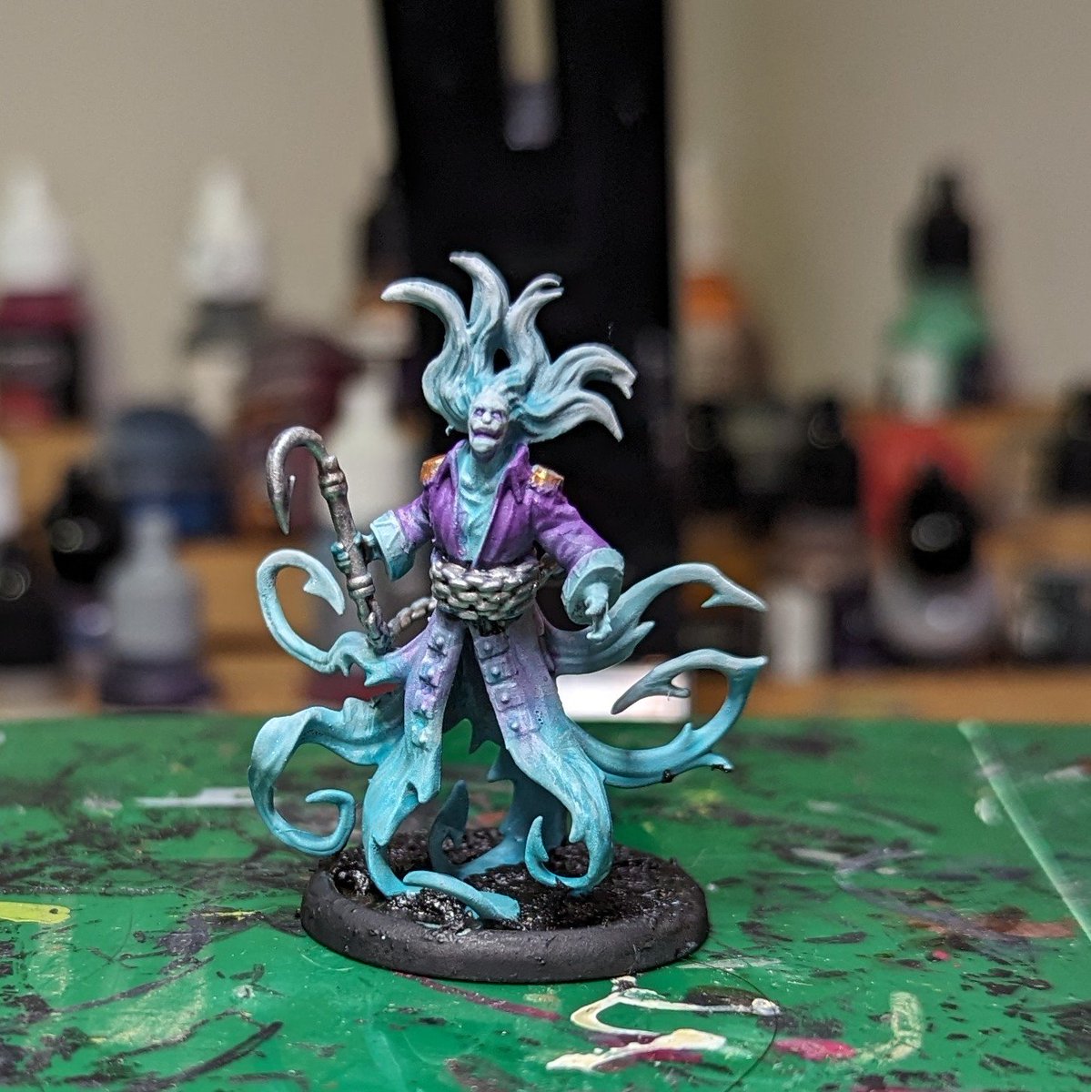 Working on a #malifaux model, Kari  Zotiko. Kari apparently used to fish cadavers out of the rivers of Malifaux to sell to Resurrectionists.

That earned them an early grave and a swift return as a vengeful spirit.