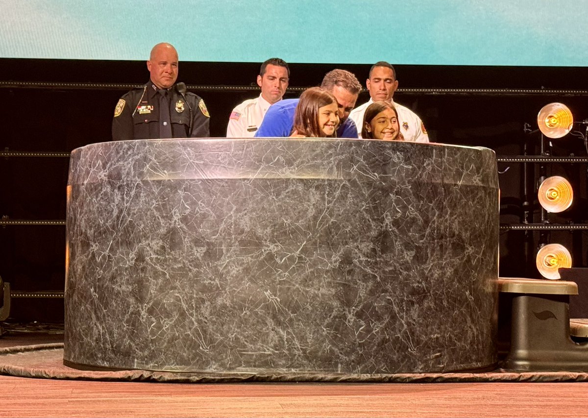 PSLPolice's tweet photo. PSLPD Officer Recognized at Child’s Baptism Who Survived Near Drowning 

Officer Joseph Chamberlin, along with @StLucieFireDist Captains Roman Garcia and Salomon Rincon, were invited to witness the baptism of 8-year-old Araceli and her sister, 10-year-old Elena, at Christ Fellowship Church Port St. Lucie this morning. 

Back in December of 2016,  a neighbor along with these three first responders played an integral role in Araceli’s life saving efforts after a near drowning in a pool that led to this miraculous day. 

However, the true hero of this story is Araceli’s sister, Elena, who at only 2-years-old at the time of the near drowning, had the courage and wherewithal to put on her water wings, jump in the pool, and pull her then 10-month-old sister to the deck. 

Miracles do happen!
