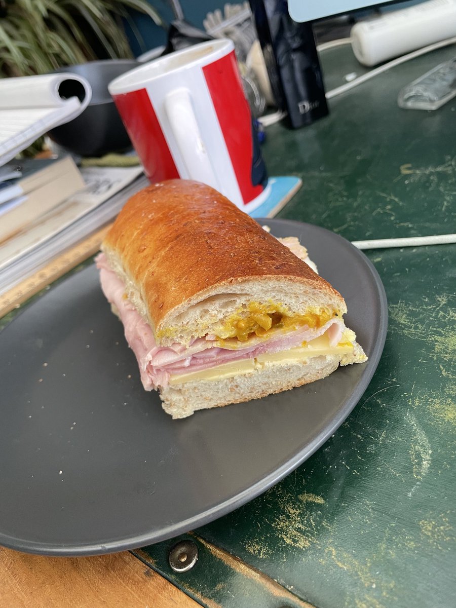 This looks like an ordinary cheese and ham/ relish sambo. But my husband made both the bread AND the butter and it was delicious.