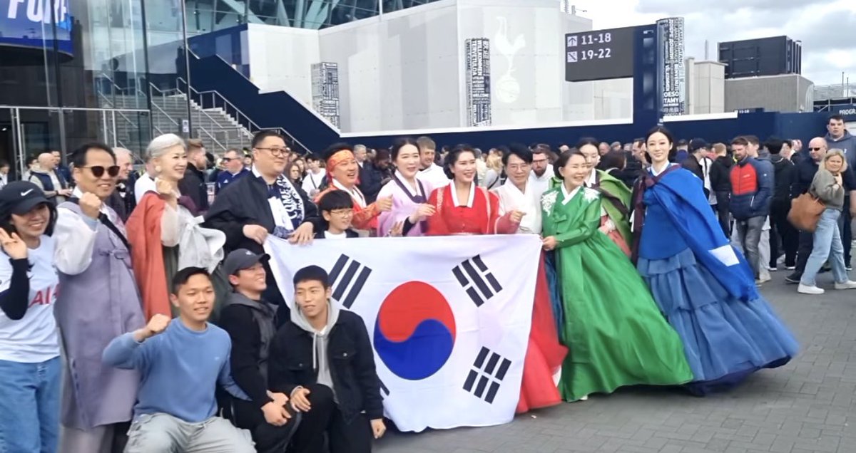 this dedicated Korean fans in their traditional costumes for Tottenham game - some supporters fly almost 15 hours from South Korea to London to watch the game