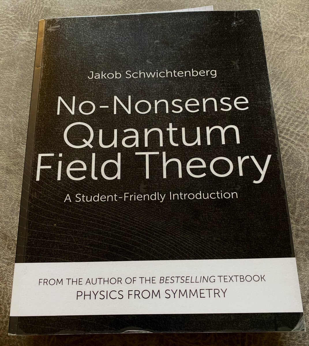 Great book for absolute beginners. Still requires lots of patience and substantial re-reading! One of the best explanations I have found of concepts such spinor, covariant derivative, gauge fields, etc.