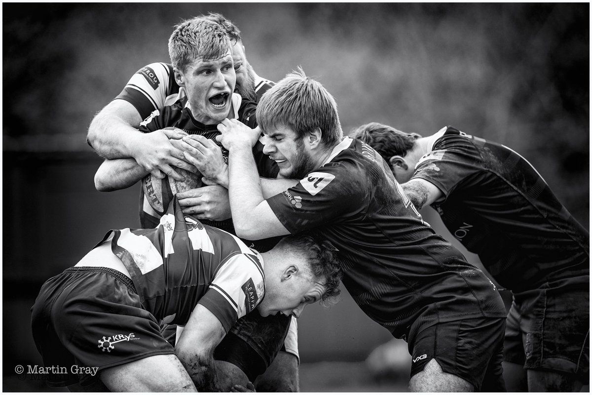 'Surrounded'... 🏉 Couldn't resist a quick B+W play with this one... A competition piece in the making! 📷 guernseysportphotography.com #blackandwhitephotography #rugbyphotos #Surrounded #rugbyaction #alderneyrugby