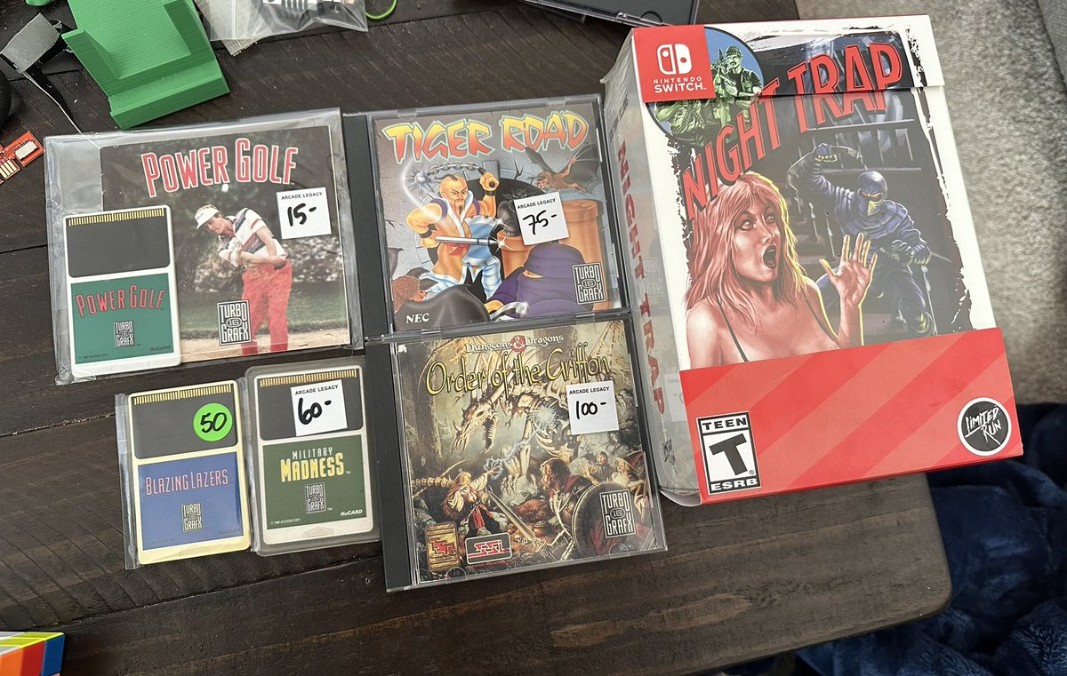 UnicityPoint's tweet image. The haul from yesterday’s convention and shop run. The Night Trap 25th Anniverary box for the Switch, and a haul of Turbografx 16 games that I got an amazing deal on 😍