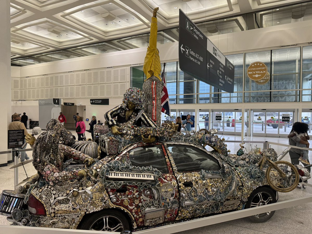 It matters not how far I fly I’m never too far from my ride or die sister in investigative journalism <a href="/WHEC_JLewke/">Jennifer Lewke</a>.  Check out this ROCKIN bedazzled tribute to Queen <a href="/iah/">Bush Airport</a>!! Bohemian Rhapsody indeed!!