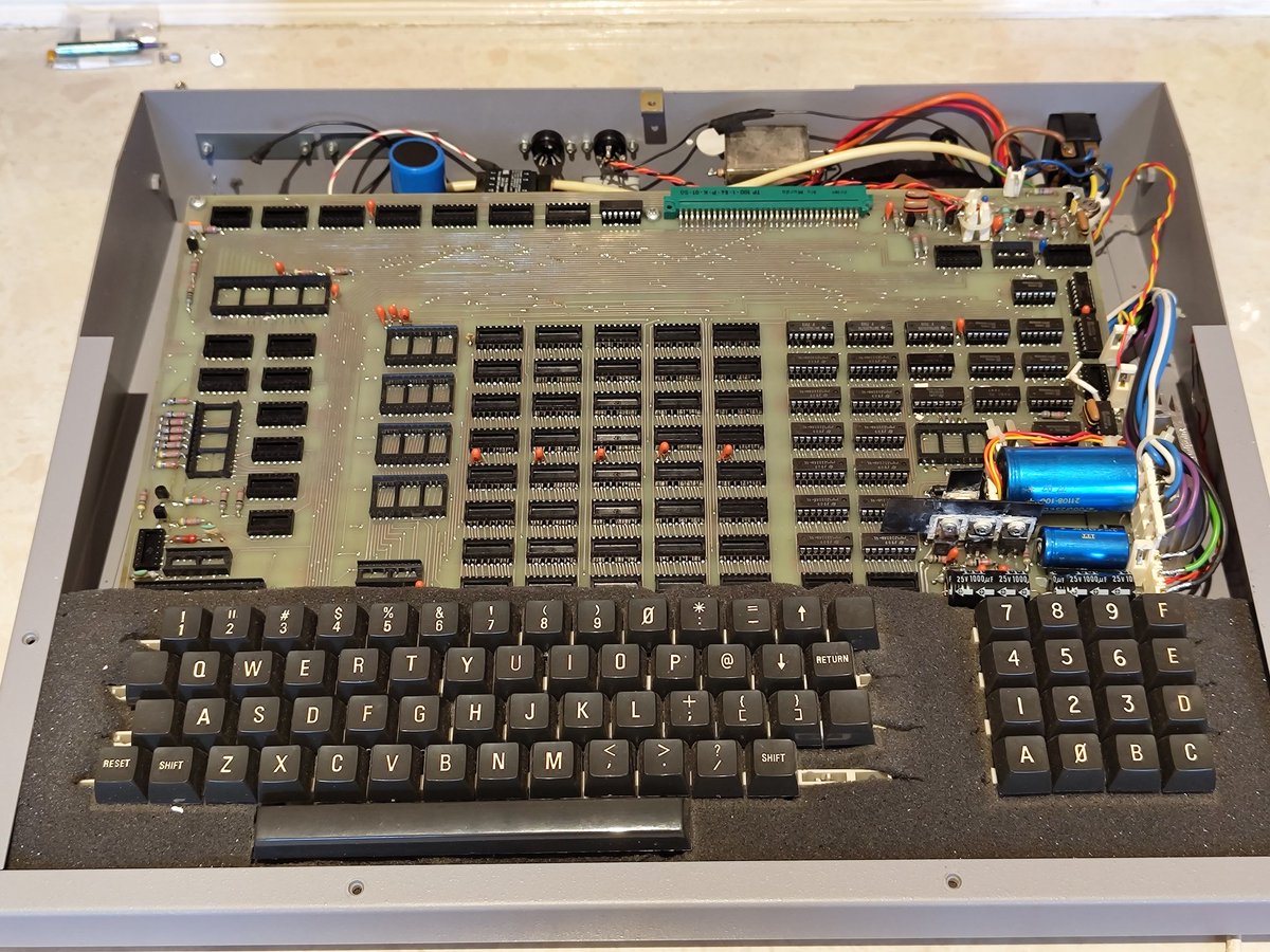 Help! I recently picked up this lovely Powertran PSI Comp 80 but it's missing a whole bunch of chips. Good news, I have the ICs. Bad news, I don't know where they go. Does anybody have a copy of the original docs or have a machine & can take photos?