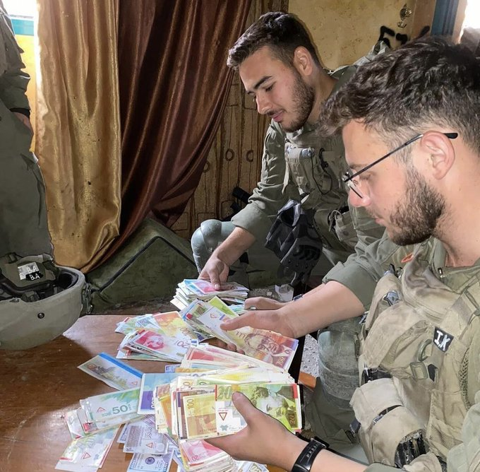💔🇵🇸 ZIONIST TERRORISTS post themselves stealing the money of the Palestinians they murdered.
