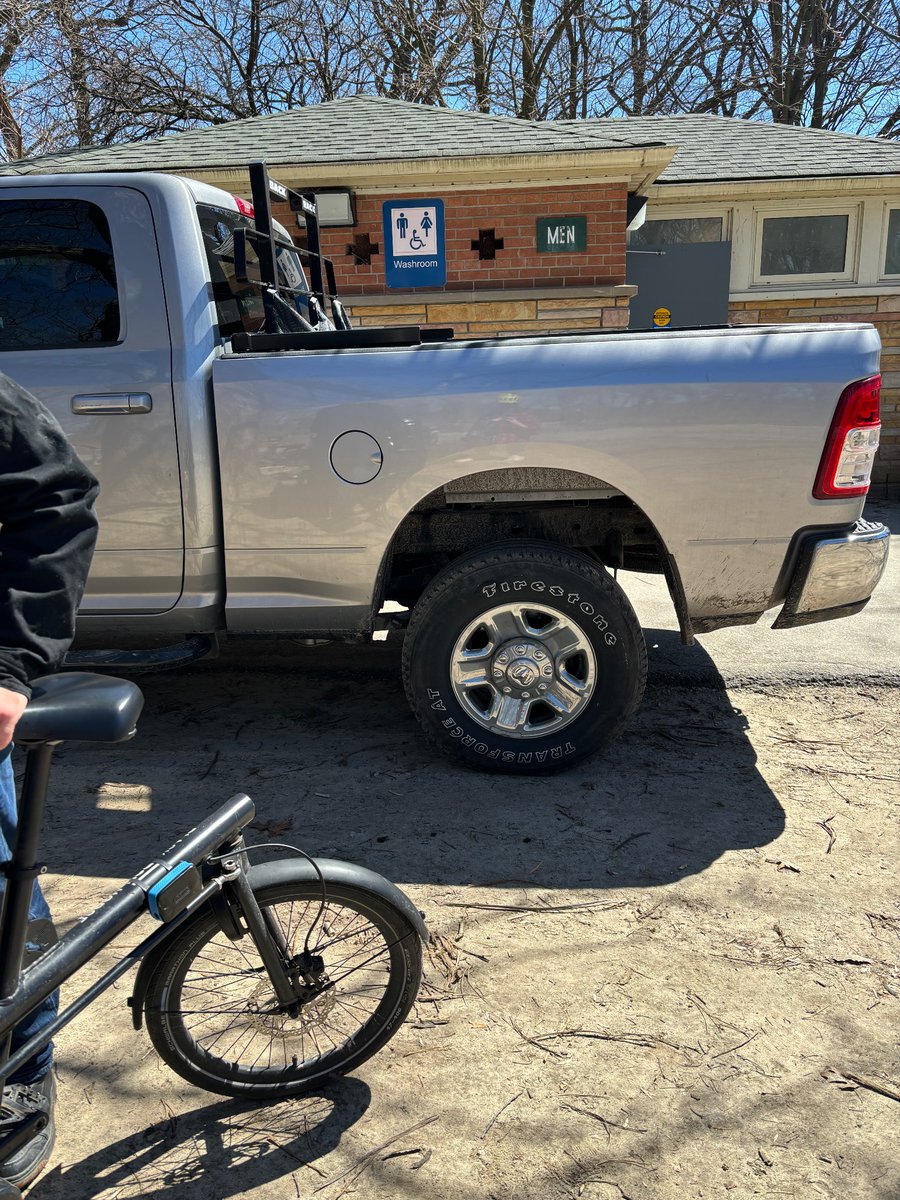 emm_a's tweet photo. Can anyone explain why a city of Toronto branded truck, driving on a pedestrian path in high park, needs to be lifted https://t.co/9YA4ULmVpJ