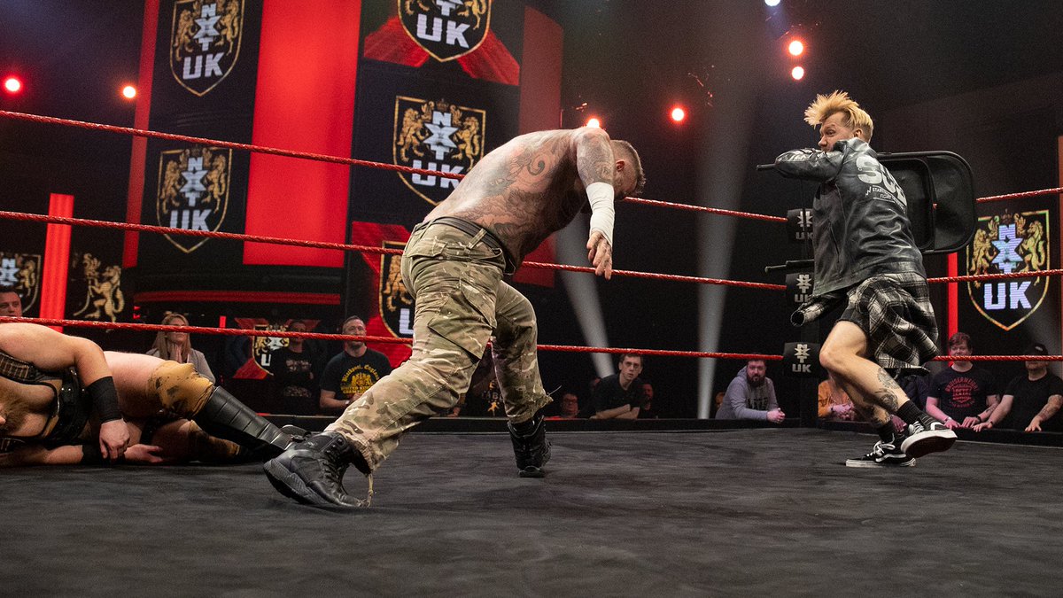 April 7, 2022: At the BT Sport Studios, @The_Primate_ defeated @WILDBOARhitch in singles competition via an assist from @EddieDennis1986. After the bell, Symbiosis held Boar in place while Dennis hit him w/a chain until @MandrewsJunior hit the scene. #NXTUK 📸 WWE