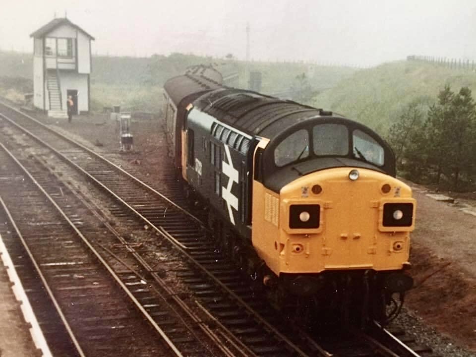 Back in Scotland and here is the misty (and grainy photograph - apologies) Georgemas Junction in 1985 with the first service from Thurso ready to join the Wick portion and then travel south to Inverness. From memory that was 37035 freshly painted but I may be wrong.