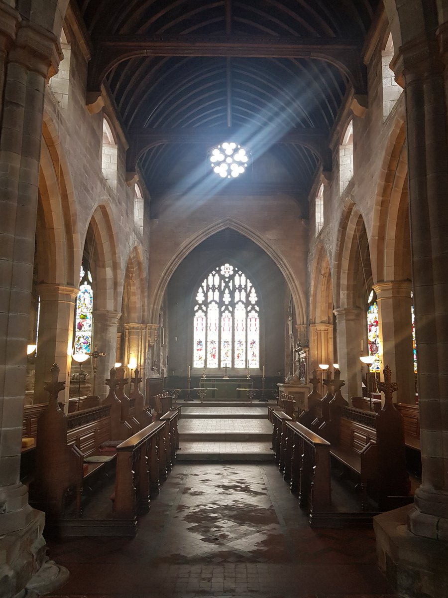 From crossing to chancel arch (C19) #StMarysWirksworth showing three bay north and south arcade of double chamfered pointed arches on octagonal piers and clerestory windows above.