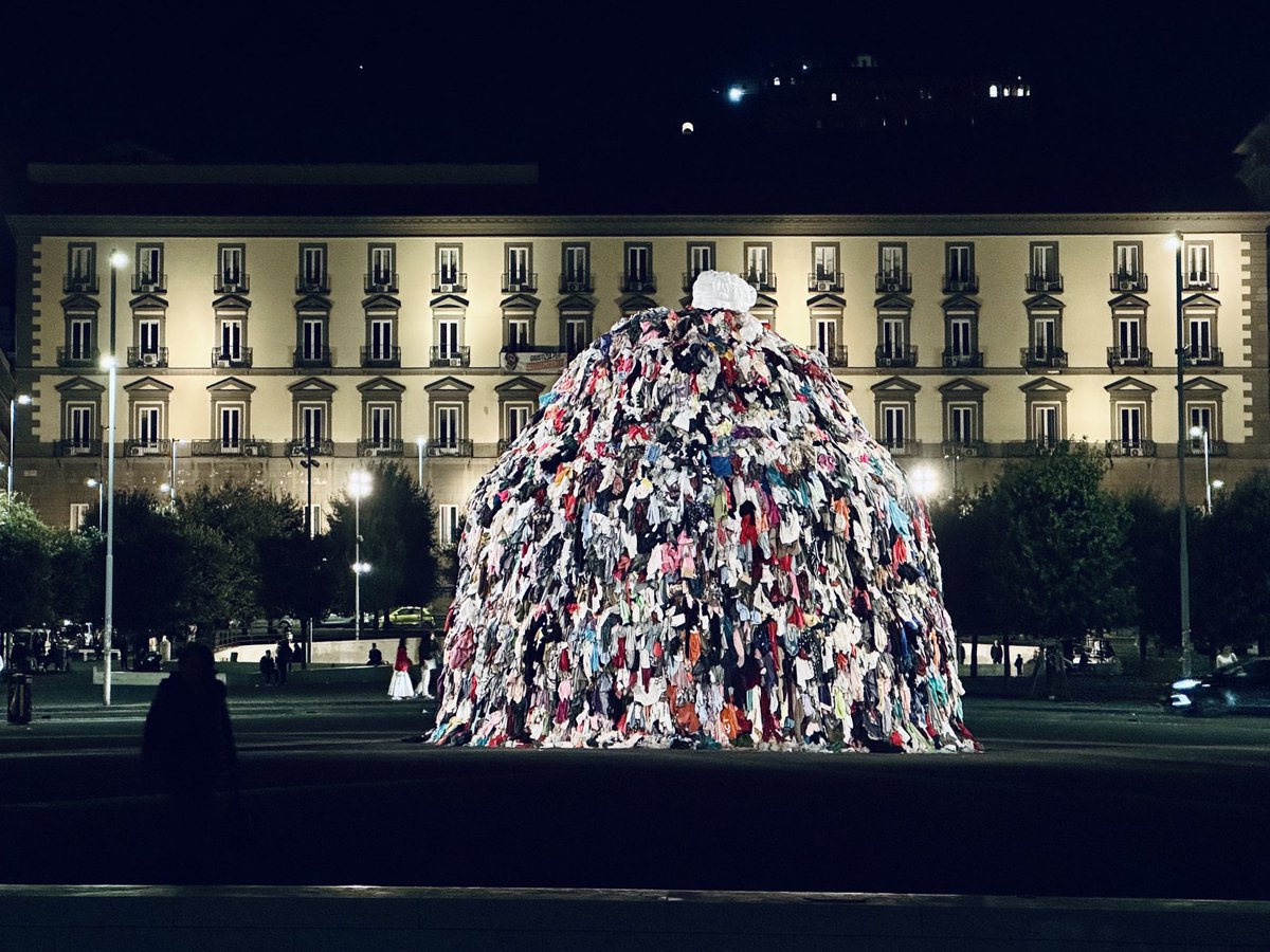 Naples at night with an enigmatic modern sculpture (it’s called “Venere degli stracci”, Venus is behind the pile)