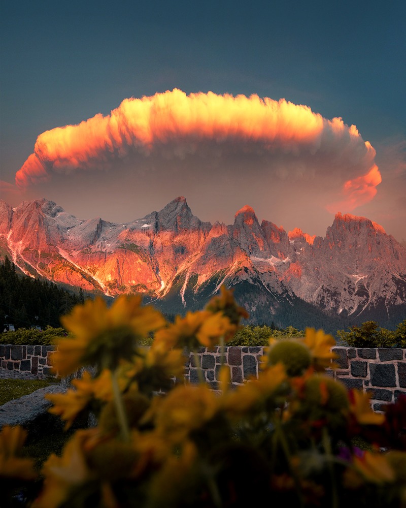 30. Burning Dolomites, Italy This is how photographer Dorpell (Dorian Pellumbi) described his luckiest shot ever: 'An apocalyptic scenario that only Mother Nature could choreograph'. The sunset always transforms the Dolomites into an otherworldly place that doesn't feel real.