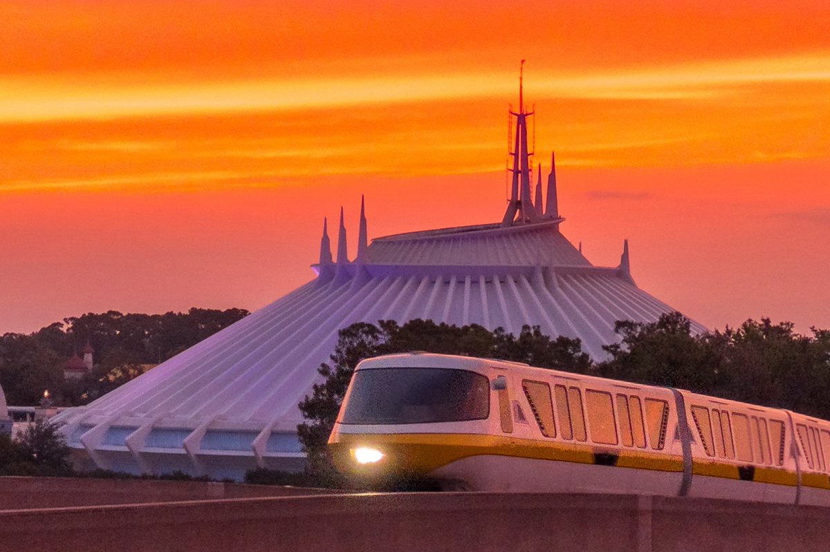 revisiting this shot I decided to crop in on the monorail and Space Mountain. the original shot is good because the sky was on fire but the parking lot and other elements took too much attention from the subjects. #waltdisneyworld #magickingdom #monorail #nikon #tamron