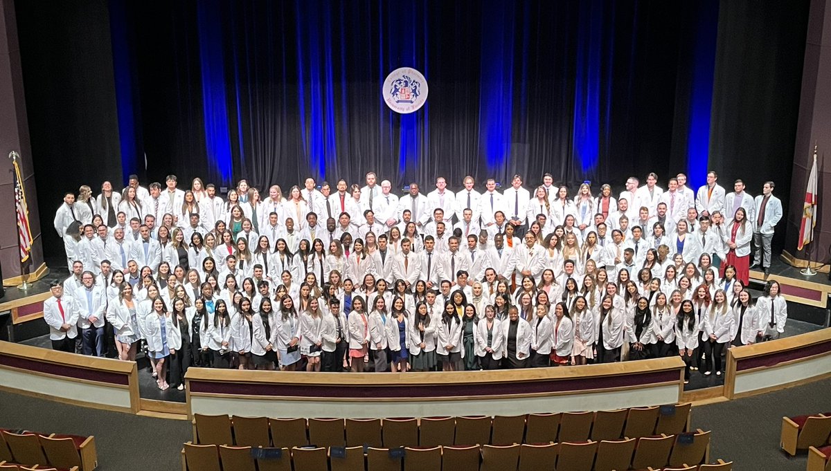 The #UFPharmacy class of 2027 looks great in their white coats! 🧡 💙