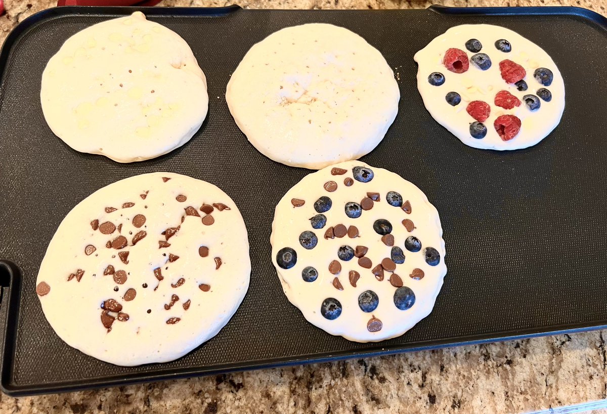 When your kids are around, you have to make pancakes! White chocolate, dark chocolate, raspberry and blueberry of course……