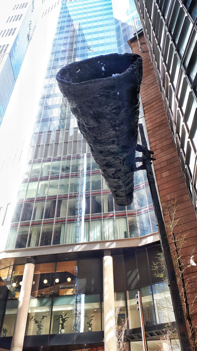 It's not often that one runs into a huge megaphone hanging overhead. Then, again, this piece is part of the #sculptureinthecity exhibit. #PhyllidaBarlow's #sculpture seems to be announcing a performance that's about to start.

This is #London 

#walking #walkingLondon