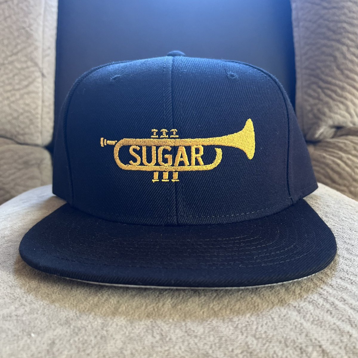 athletelogos's tweet photo. Who wants this new Sugar trumpet hat?

RT &amp; Follow to enter, winner announced tomorrow. #LFGM 🎺

https://t.co/LfKLrb8lio https://t.co/SMifA4AkQM