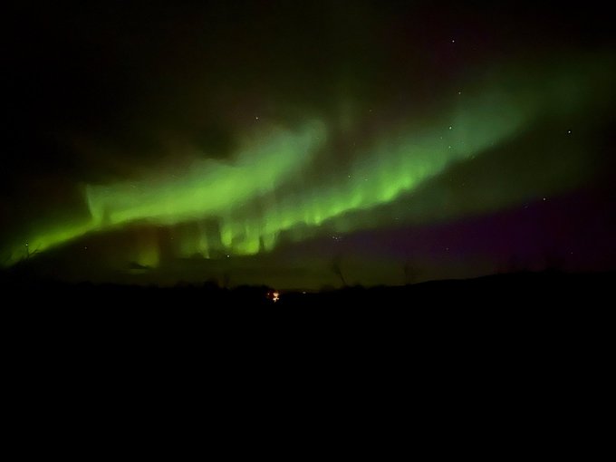 2 pic. Guys!!! I got to see the #northernlights here’s a few iPhone pics as I am currently watching them