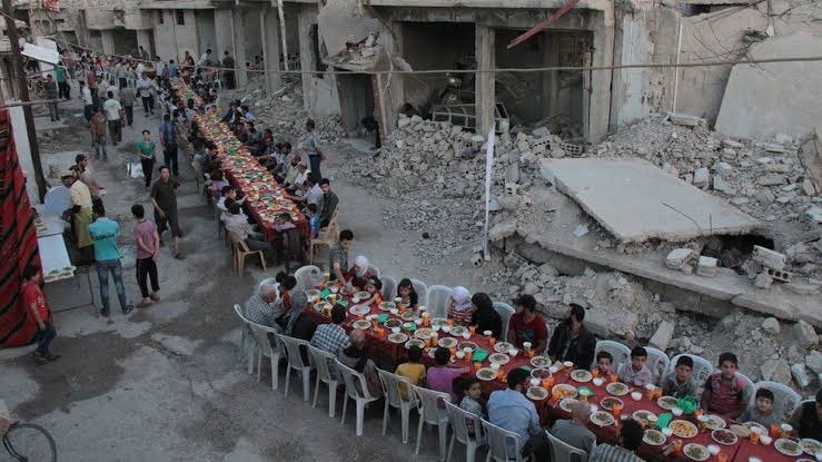 Bashar Al Assad and his First Lady Asma “breaking fast” today in Tartous, after starving, torturing, killing displacing and bombing anyone who did not want their dictatorship anymore. 

Vs 

Syrians in Douma in 2017 breaking fast under Assad’s siege amongst the rubble of their…