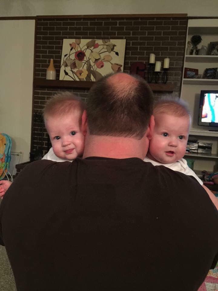 On April of every year, I take a backwards photo holding my twin daughters. 2016.