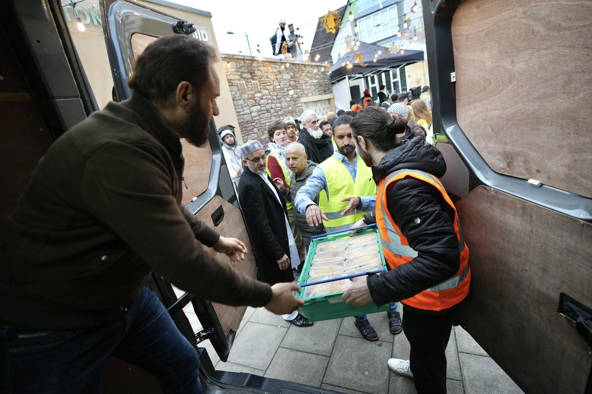 First tray of food leaves the van at the Grand Iftar. This is what community looks like.