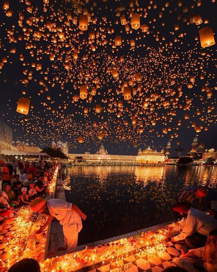 3. Festival of Lights 
The floating of lights looks really similar to Diwali . Diwali is celebrated in Indian culture !! it would make sense especially if an Indian women locked her tower is looking at the Festival of Lights
