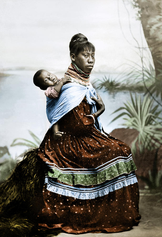 GullahGeecheeSC's tweet image. Black Seminole woman and child in the Florida Evergreens