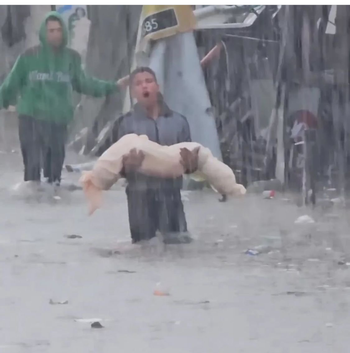 Hamza_a96's tweet image. The world watched a young Palestinian boy carry the corpse of a child through the rain and it made zero difference.