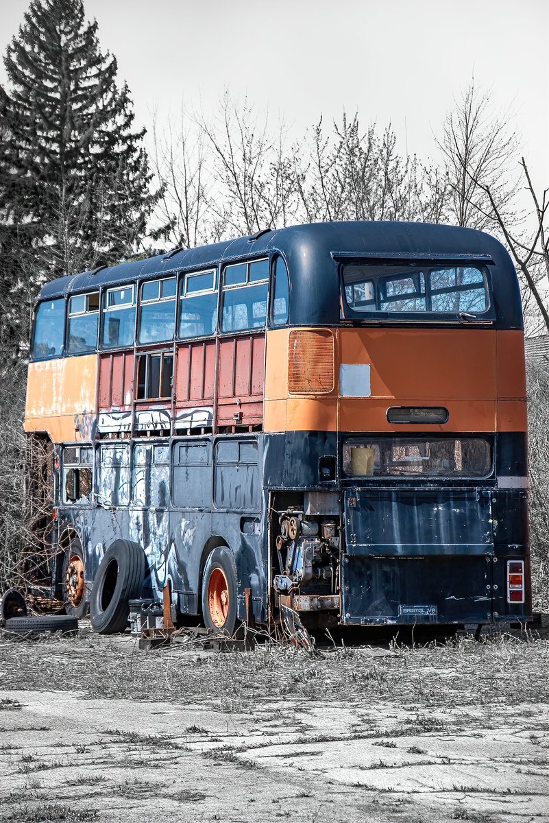 A forgotten double-decker bus found on a vacant lot on the side-streets of Cleveland, Ohio.