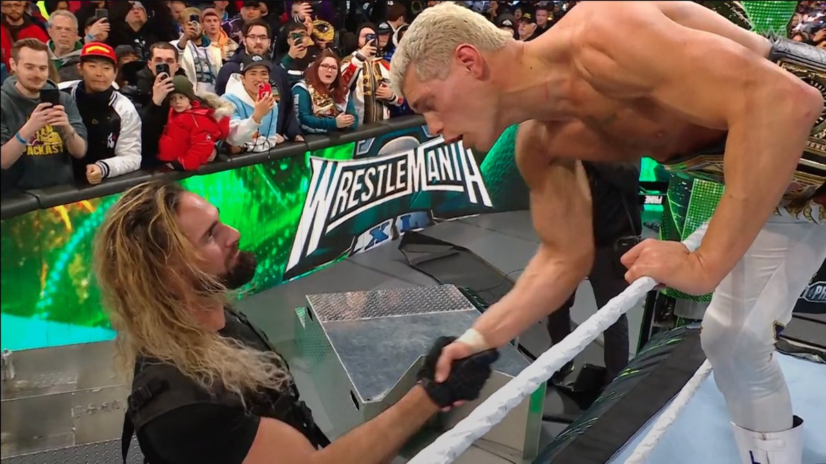 Cultaholic's tweet photo. Seth Rollins and Cody Rhodes shake hands #WrestleMania https://t.co/dHD90Pf3DQ