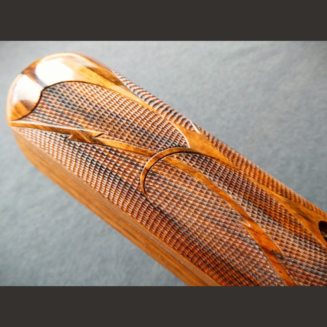 UllmanPrecision's tweet photo. If anyone knows how to make something worth looking at, it's Evan Koch! Evan just finished up this beautiful piece of Turkish Walnut checkered at 22 LPI. The unique ribbon pattern is a true statement piece and a testament to Evan and his craft as he hand drew and cut them. https://t.co/f0GmfbsGxW