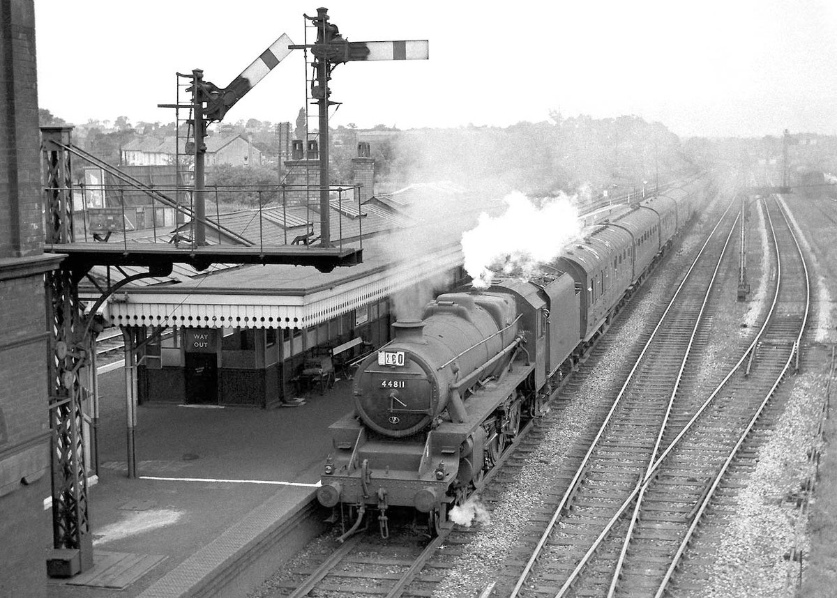 Ex-LMS 5MT 4-6-0 No 44811 passes through Water Orton station with a Class A express service for Nuneaton circa 1960 Photo by James S Doubleday