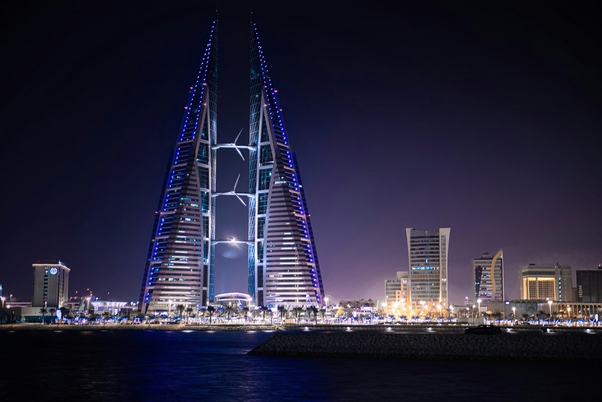 The world's first skyscraper to integrate #wind turbines into its design was completed #OTD in 2008. The Bahrain World Trade Center’s turbines, supported by 3 skybridges, provide 11-15% of the towers’ total power consumption.