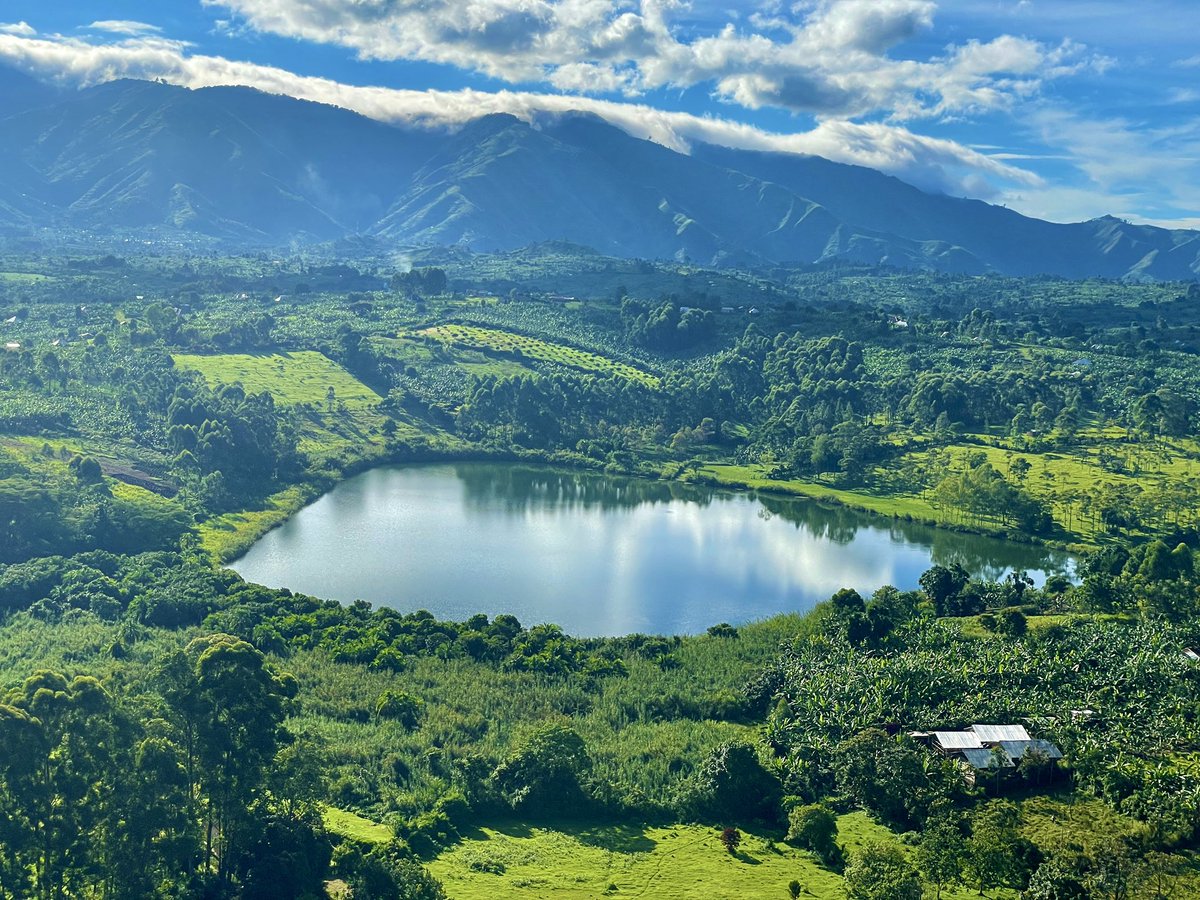 Beholding the captivating beauty of L. Wabikere from Kyeganywa Hill's summit in Fort Portal is an experience beyond words Its tranquil waters, cradled by lush greenery, exude a serene aura reminiscent of sacredness Its a perfect place for those seeking for corporate serenity